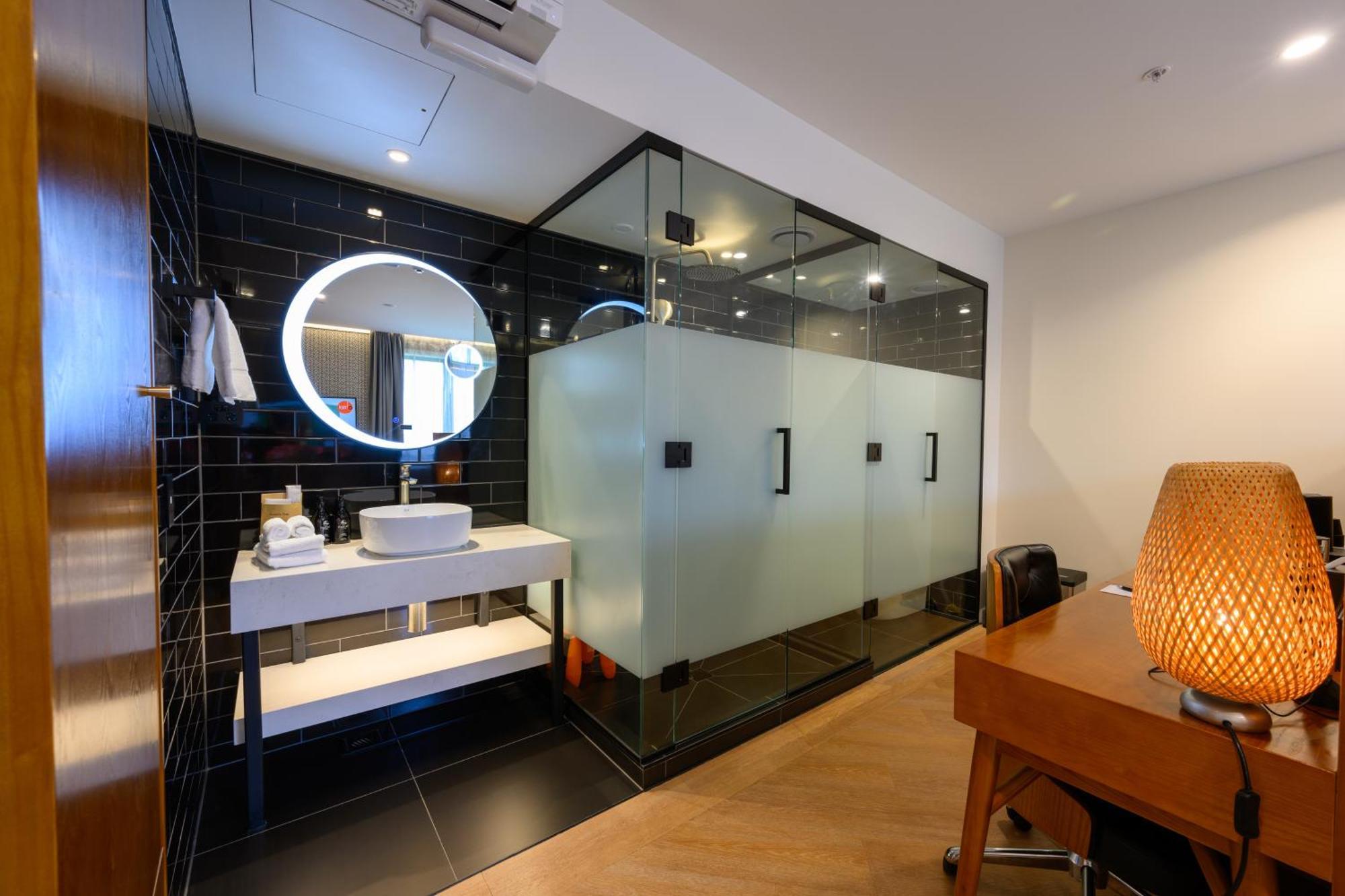 Ohtel Auckland Hotell Rom bilde A bathroom in a hotel